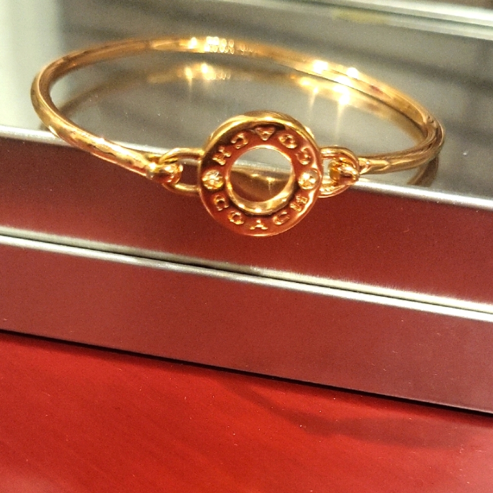 Coach Gold Elegant Bracelet with Circular Detail